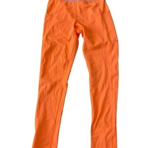 Free People Movement orange high waisted leggings